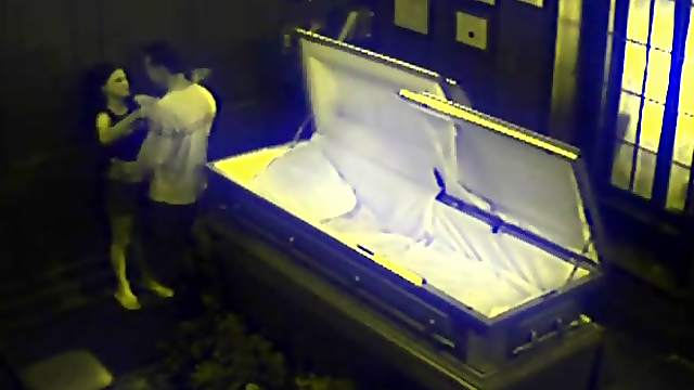 Voyeur sex in a coffin with a kinky couple