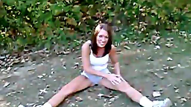 Sporty chick goes topless outdoors to tease