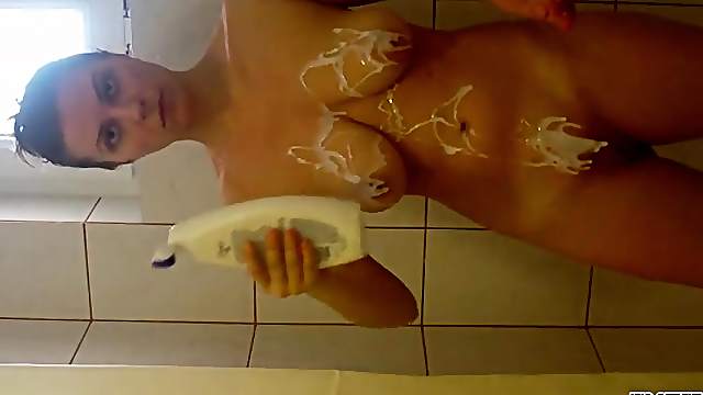 Amateur tease takes a naughty shower on cam