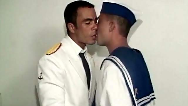 Latin guys in uniform kiss and suck cock