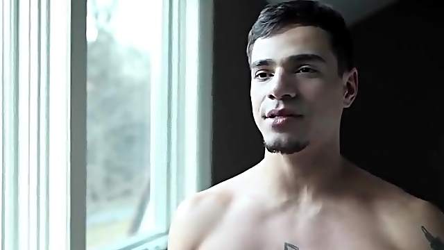 Interview with a shirtless gay pornstar