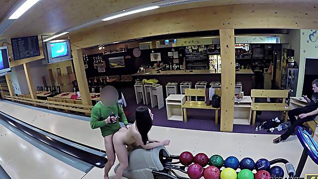 Aroused amateur babe fucked at the bowling alley without knowing she is being filmed
