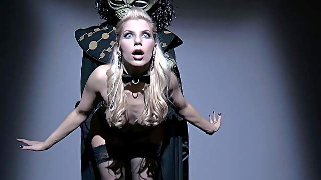 Ashley Fires, with her signature blonde locks and fearless kinks, takes on the iron challenge.